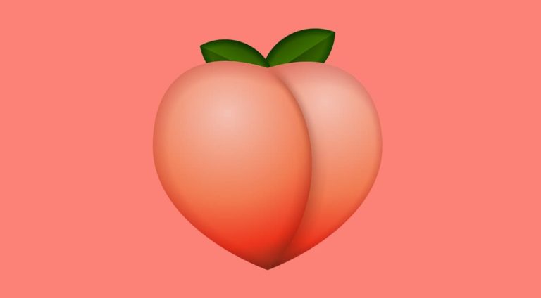 A large peach emoji against a peach-colored background.