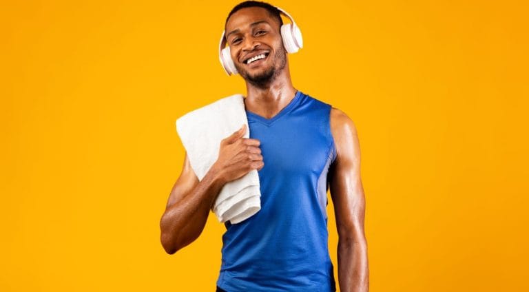 Handsome black man with headset and towel